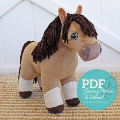 a stuffed horse is sitting on the floor