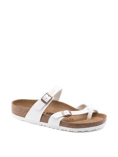 Supremely comfortable with sophisticated, crisscross straps, the Mayari redefines the thong sandal with a single toe loop. Complete with classic BIRKENSTOCK design elements, like adjustable buckle closures and a contoured footbed for the ultimate in support. Contoured cork-latex footbed creates custom support with wear Suede footbed lining helps keep you comfortable Lightweight EVA sole Two straps with adjustable metal pin buckles Made in Germany Hot Sandals, White Birkenstocks, Birkenstock Styles, Birkenstock Women, Birkenstock Sandals, Birkenstock Mayari, White Sandals, Birkenstock Shoes, Comfortable Sandals