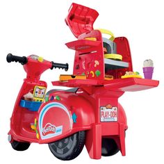 a toy scooter that is red and has ice cream on top of it