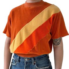 Vintage 1970s Womens Orange Velvet Retro Psychedelic Mid Mod Short Sleeve Tee Will best fit a size M Color: orange  Material: polyester-velvet Excellent vintage condition  Collar to hem: 23"  Pit to pit: 20"  Modeled on a medium/size 6/ 5 foot 7/ 140lbs/ 34 C/ 28" inch waist Retro Orange Crew Neck T-shirt, Retro Orange T-shirt For Fall, Orange Retro Crew Neck T-shirt, Retro Orange Tops For Fall, Retro Orange Cotton T-shirt, Vintage Orange Fall Tops, Retro Orange Short Sleeve Tops, 28 Inch Waist, Orange Velvet