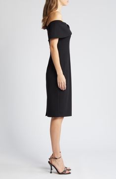 Make the night memorable in this cocktail dress designed in a shoulder-baring silhouette with a twisted neckline. 37" length (size 8) Back zip closure Off-the-shoulder neck Short sleeves Lined 96% polyester, 4% spandex Hand wash, dry flat Imported Formal Off-shoulder Dresses With Structured Shoulders, Fitted Evening Off Shoulder Sheath Dress, Fitted Sheath Off Shoulder Dress For Evening, Structured Off-shoulder Cocktail Dress, Off-shoulder Cocktail Dress With Structured Shoulders, Black One-shoulder Knee-length Dress For Evening, Black One Shoulder Knee-length Evening Dress, Black One-shoulder Knee-length Evening Dress, Black Knee-length One Shoulder Dress For Evening