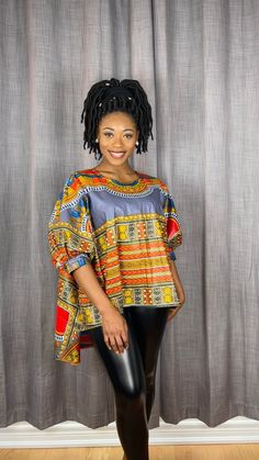 Oversized High-low Boubou Top. Light and care-free! This piece fits Small to XXL. Model is a size medium and 5'6" tall. Length: 35" Material: 100% Cotton Ankara Fabric. Free size customization available. Ankara Tops Blouses, African Print Top, African Tops, African Print Tops, African Print Dress Ankara, All Hairstyles, Evening Dresses With Sleeves, African Fashion Modern, Handmade African