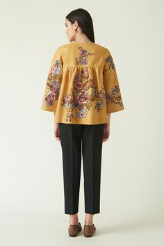 Mustard three quarter sleeve jacket with contrast floral embroidery.
Components: 1
Pattern: Embroidery
Type Of Work: Flower
Neckline: Round Neck
Sleeve Type: Three Quarter Sleeves
Fabric: Linen
Color: Yellow
Other Details: 
Asymmetric button closure
Front pocket
Note: Pant worn by the model is not for sale
Occasion: Party,Resort - Aza Fashions Floral Embroidered Top With 3/4 Sleeves For Spring, Spring Floral Embroidered Top With 3/4 Sleeve, Payal Pratap, Yellow Embroidery, Jacket For Women, Embroidered Jacket, Jackets Online, Embroidery Flowers, Three Quarter Sleeves