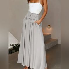 These Plus Size, Lace-Up, Wide-Leg Pants Are Perf For Spring And Summer. The Lace-Up Front Is A Stylish Touch, And The Pants Are Loose And Comfy. Throw On A Tank Top, T-Shirt, Or Blouse, And You're Ready To Take On The Day. Gray Lace Up Wide Leg Pants Casual Loose Pants For Spring & Summer, Women's Plus Size Size Oxl/12 Waist: 33.9-36.2inhips: 43.7-46.1in Bottom Length 40 Inseam 27.5 Color Gray Material: Polyester Style: Vacation Operation Instruction: Machine Wash Or Professional Dry Clean Seas Elegant Vacation Bottoms Solid Color, Elegant Solid Color Vacation Bottoms, Gray Wide Leg Pants For Summer, Elegant Beach Bottoms With Pockets, Fashion Trousers, Loose Trousers, Bohol, Hannah Montana, Weekend Brunch