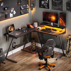 a desk with a chair and computer on it