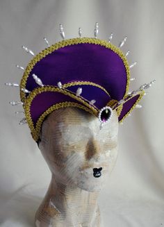 Fantasy Hats And Headpieces For Carnival, Fantasy Costume Hats For Carnival Events, Fantasy Costume Hat With Tall Crown For Carnival, Fitted Fantasy Costume Hats And Headpieces For Halloween, Tall Crown Costume Hats And Headpieces For Carnival, Gothic Costume Hats And Headpieces For Mardi Gras, Fantasy Headpieces For Mardi Gras Costume, Fitted High Crown Costume Hats And Headpieces, Fantasy Costume Headpiece For Mardi Gras