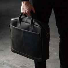 Leather black bag for men suitable for 13 or 15 inch laptops. This stylish and practical accessory is great for both professional use and everyday wear. FUNCTIONALITY: This product is a combination of practicality, style and quality. Leather type: Crazy Horse Bag size: 42 x 31 x 10 cm / 16.3 x 12 x 3.9 inch 2 main compartments Inside zipper pocket and 2 pockets for phone/accessories Detachable shoulder strap with leather inserts External pockets on both sides with magnets Quest box size: 50 x 35 x 15 cm / 19.5 x 13.65 x 5.85 inc Includes a black belt with a silver buckle Strap length from 115 to 135 cm + 6 cm buckle, thickness 4 mm, width 4 cm  Strap length from 44.85in to 52.65in + 2.34 cm buckle, width 1.56in 🔘 PERSONALIZATION 1 Step - Laser engraving: Front text or inside text For exam Professional Black Bag For Everyday Use, Professional Leather Laptop Bag For Everyday Use, Professional Laptop Bag With Leather Lining For Everyday Use, Classic Black Soft Leather Laptop Bag, Black Leather Laptop Bag For Business, Black Leather Case For Daily Use, Black Briefcase With Leather Lining For Everyday Use, Black Briefcase With Laptop Sleeve For Work, Black Leather Cases For Daily Use