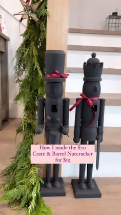 two nutcrackers are standing next to each other on the floor with a sign that says how i made the s77 / 7 crate & barrel nutcracker