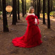 Beautiful brown red tulle gown perfect for maternity photoshoots or themed dress parties. This dress looks amazing in maternity photoshoot, solo and couples shoot. For photographers looking to add to their client wardrobe, we recommend going with the larger size as the dress comes with adjustable strings at the back and you can use your clips for smaller size clients. The robe is made from tulle with tulle ruffles. It looks amazing in lots of different settings but our regular favorite is the ou Red Floor-length Maternity Dress, Red Dress Maternity Shoot, Red Tulle Gown, Red Maternity Dress, Red Tulle Dress, Tulle Ruffles, Couples Shoot, Outdoor Photos, Tulle Gown