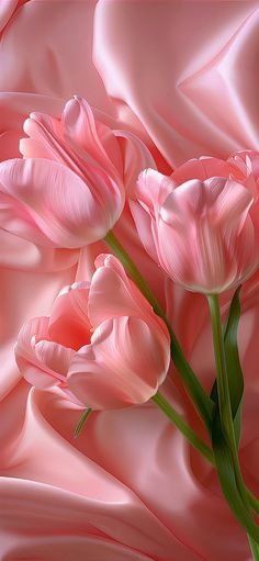 three pink flowers are in the middle of a silk fabric pattern, with green stems sticking out of it