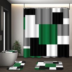 a bathroom with black, white, and green shower curtains in the shape of squares