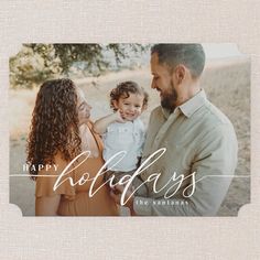 a holiday card with the words happy holidays on it and an image of a family