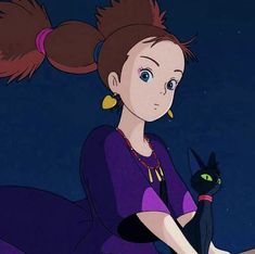 a woman sitting on top of a bed holding a black cat in her lap and looking off into the distance