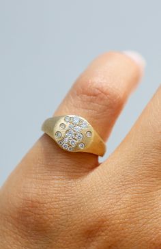 Such a fun addition to any stack! I love this ring specifically as a pinky ring, but have also seen it worn any way and it's stunning. This ring comes insolid 14K Yellow, White, and Rose Gold. This design is handmade, so please allow up to 6 weeks for delivery. White Gold Pinky Ring, Everyday Oval Brilliant Cut Ring, 14k Gold Signet Ring With Rose Cut Diamonds, 14k Gold Open Signet Ring With Rose Cut Diamonds, Gold Pinky Ring, Custom Ring Designs, Design Board, Custom Ring, Jewelry Lookbook