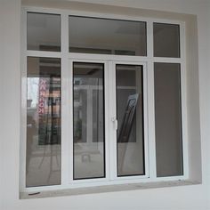 an open window on the side of a building with no glass in front of it