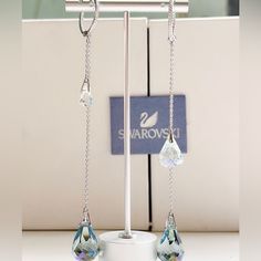 Authentic Swarovski Spirit Hoop (Dangling) Earrings, 5521784. Many Looks. White Rhodium Plated Metal, Aqua Blue And White Clear Crystals. Brand New, Never Worn In Original Inner Box With A Tag. Measurement : 5 Inches X 0.6 Inches ( 12.9 1.6 Cm ) Retail Price Was $169. Can Wear In Many Different Ways As Dangles (With The Aqua Blue Crystals) Or As Hoops. This Beautiful Earrings Feature A Light Blue, Drop-Shaped Swarovski Crystals Dangle From The Hoops, Refracting The Light Whenever You Move Your H Blue Crystal Earrings, Oval Stud Earrings, Light Earrings, Heart Dangle Earrings, Purple Rhinestone, Swarovski Crystal Earrings, Hanging Earrings, Pearl Earrings Dangle, Swarovski Earrings