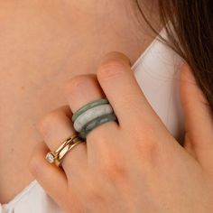 Elevate your style with our stunning Jadeite Jade Ring Set, featuring three uniquely carved bands. Each ring showcases the timeless beauty of Jadeite, exuding elegance and versatility.  This set cand be worn as 3 stackable rings all together for a bold statement, or spread them across multiple fingers for a delicate, layered look. The trio includes rings of different widths and shades, making it a standout addition to your jewelry collection.  Available in multiple sizes to ensure the ideal fit for any wearer. Materials: Jadeite  Packaging: The item comes in our signature packaging.  Care Instructions: We recommend to avoid any chemicals, such as perfumes, soap, or cleaning agents.  The jewelry should be stored in their original packaging, in a dry and cool place! Jade Rings For Women, Garden Ring, Jade Rings, Ring Bands, Forever Jewelry, Jade Ring, White Jade, Jewelry Ring Box, Set Ring