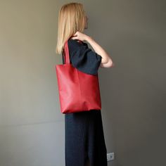 Height -  35 cm  ( 13,78 " ) Top width from seam to seam - 34 cm  ( 13,38 " ) Bottom width - 27 cm ( 10,63 " ) Depth -     6 cm  ( 2,36 " ) Handles - 51 cm  ( 20,07 " ) This red orange tote bag is made of light faux leather. Red tote bag has a cotton lining, 3 pockets inside for small items. Red orange tote bag is fastened with a magnetic button. Beautiful red tote bag for woman minimalist style. Shopper tote bag red for woman. Dark orange tote bag women's. Shoulder bag red brick color handmade rectangular shape. Vegan red handbag unique. Women's vegan orange bag rectangular for women. Rectangular bag city fashion fashion. Handmade red orange handbag in minimalist style. Minimalist Handbag, Orange Tote Bags, Orange Handbag, Bag Minimalist, Red Tote Bag, Brick Colors, Red Tote, Red Handbag, Dark Orange