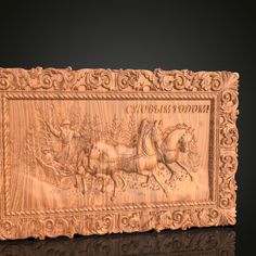 an intricate carved wooden plaque depicting two horses and riders on a sleigh ride