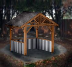 a gazebo made out of metal and wood in the middle of a wooded area