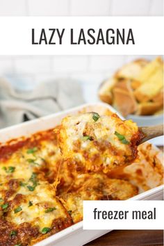 a white casserole dish filled with lasagna and topped with fresh parmesan cheese