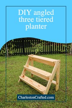 a wooden planter sitting in the grass with text overlay reading diy angled three tiered planter