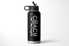 a black water bottle with the word coach on it