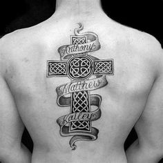 the back of a man's upper body with celtic tattoos on his lower back