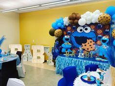 a birthday party with blue and white decorations