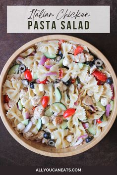 pasta salad in a wooden bowl with the title above it