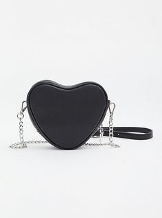 Your love for all things edgy will go noticed with this beautifully studded crossbody bag! A bold, limited-edition collection that combines the pretty-meets-punk aesthetic of Betsey Johnson with Torrid’s. Top zip closure. 6”L x 1. 875”W x 5. 5”H. 58” removable crossbody strap. Interior zip pocket. Man-made materials. Imported. The best plus size women's betsey johnson black faux leather studded heart crossbody bag handbags in black. Torrid is your destination for the freshest spring and summer s Edgy Party Crossbody Bag, Edgy Crossbody Party Bag, Edgy Crossbody Bag For Concerts, Edgy Crossbody Bag For Party, Trendy Heart-shaped Shoulder Bag With Detachable Strap, Gothic Crossbody Shoulder Bag, Edgy Faux Leather Bag With Zipper, Edgy Faux Leather Bag With Zipper Closure, Heart Crossbody Bag