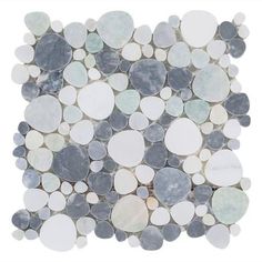 a white and grey tile with circles on the bottom, in various shades of gray