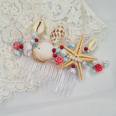 This elegant hair piece made with starfish, seashell, white and ivory  pearl, flowers and crystals.  This hair comb is perfect for bride, bridesmaid, and flower girl. Custom order always welcome, please contact us Shipping: - Tracking number - Your item will be carefully packaged and shipped with love❤ Thanks for looking! https://www.etsy.com/shop/CyShellBridal Shells Hair Comb* Seashell Headpiece* Starfish Hairpiece* Beach Hair Accessory* Decorative Hair Comb* Pearl Headpiece* Shells Hair Comb* Seashell Headpiece, Beach Wedding Headpieces, Mermaid Headpiece, Seashell Hair, Beach Hair Accessories, Decorative Hair Combs, Beach Shells, Pearl Flowers, Pearl Beach