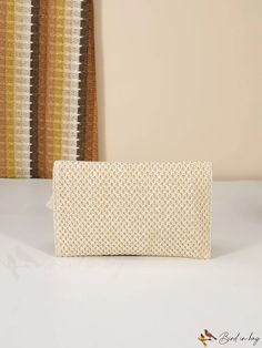 BirdinBag - Chic Tassel-Adorned Woven Clutch with Flip Cover: Perfect Minimalist Accessory Everyday Portable Rectangular Clutch, Rectangular Beige Pouch For Daily Use, Beige Rectangular Clutch For Daily Use, Beige Portable Rectangular Pouch, Everyday Cream Rectangular Clutch, Beige Woven Clutch For Daily Use, Cream Rectangular Clutch For Everyday Use, Cream Rectangular Clutch For Daily Use, Beige Square Clutch For Daily Use