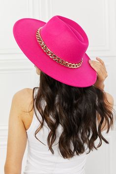 This super trendy felt hat comes in a beautiful fuchsia color that can bring a neutral outfit to life! This hat features a chain detailing and adjustable straps. Ships within 2-3 business days Type: Fedora hat Pattern type: Contrast Material: 90% polyester, 10% plastic Imported Product measurements: Brim: 3.5 in Interior width: 6.8 in Height: 4 in Fedora Hat Pattern, Felt Fedora, Stylish Hats, Pink Hat, Fuchsia Color, Neutral Outfit, Affordable Jewelry, Felt Hat, Fedora Hat