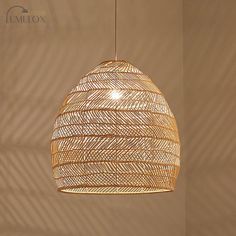 Enhance the ambiance of your dining area with the Madeleine Rattan Cloche Pendant Ceiling Light. Crafted from high-quality rattan, this Asian-inspired single-bulb suspension lighting fixture exudes elegance and adds a touch of rustic charm to any space. Its cloche-shaped design allows the light to diffuse beautifully, creating a warm and inviting atmosphere. Perfect for hanging over a dining table or chen island, this pendant light seamlessly blends functionality with style. The adjustable cord ensures easy installation and allows you to customize the height according to your preference. Whether you're hosting a dinner party or enjoying a family meal, the Madeleine Rattan Cloche Pendant Ceiling Light brings a unique and sophisticated appeal to any room.Size: 14" 18" 20" 23.5" 31.5" 39.5" F Restaurant Ceiling Lights, Lights Over Dining Table, Minimalist Ceiling Light, Rattan Shades, Rattan Lamp, Rattan Pendant, Dome Pendant Lighting, Rattan Pendant Light, Traditional Farmhouse