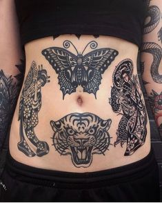 a woman's stomach with tattoos on it and an image of a butterfly, tiger, snake, and other animals