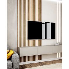 a living room with a large flat screen tv mounted to the side of a wall