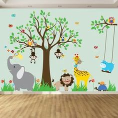 an animal themed wall mural in a children's room