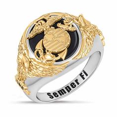 This is a ring that tells the world what you stand for. It is a symbol of strength and fortitude, a shining salute to America'sfighting forces. It is a custom-cut genuine black onyx center stone emblazoned with a gleaming U.S. Marine Corps emblem in raised relief. Two proud American eagles, richly plated with 14kt gold, are perched on the ring’s shoulders. "Semper Fi" is indelibly engraved on the inside of the band. As the perfect finishing touch, your name is engraved FREE, adding deep personal Marine Corps Rings, Army Rings, Heirloom Rings, Proud American, Eagle Ring, Mens Gold Jewelry, Mens Gold Rings, Retro Punk, Danbury Mint