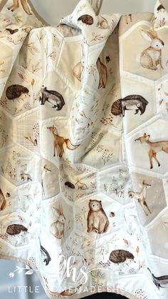 an animal print fabric with animals on it