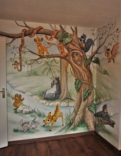 this is an image of a children's room with animals painted on the wall