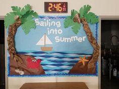 a bulletin board that says sailing into summer with palm trees and crab on the beach