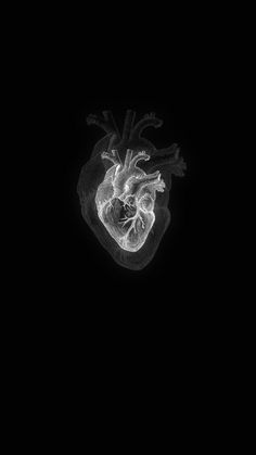 an image of a heart in the dark