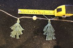 some tassels are tied to a measuring tape