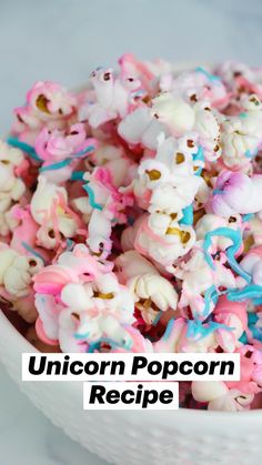 unicorn popcorn recipe in a bowl with sprinkles on top and the title overlay