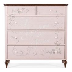 a pink dresser with flowers painted on the drawers and lettering that says i love you