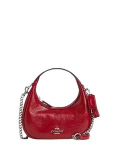 Patent leatherInside zip pocketZip-top closure, fabric liningHandles with 5" dropDetachable strap with 23 1/2" drop for shoulder or crossbody wear7 3/4" (L) x 4" (H) x 2 1/2" (W)   ( Mini Size )Style No. CW036Color: Red Mini Pepper Crossbody Coach, Crossbody Coach, Red Crossbody, Mini Crossbody Bag, Mini Crossbody, 4 H, Crossbody Bag, Red, Fabric