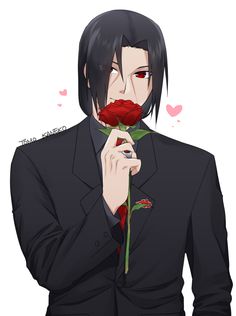 a man in a suit holding a rose up to his face