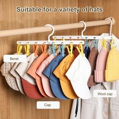 there is a rack with hats hanging on the clothes hanger, and it says suitable for a variety of hats